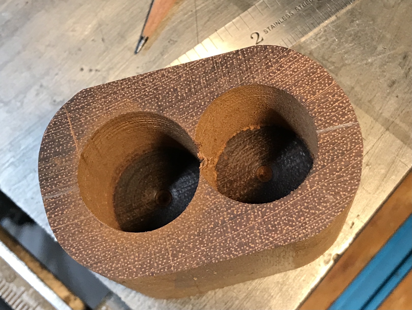 The dice cup drilled to depth in both holes.